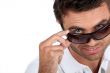 Man wearing sunglasses in studio