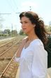 Woman waiting at train station