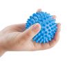 Woman`s hand with massage ball