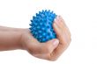 Woman`s hand with massage ball