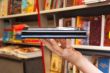 Hand holds electronic book reader
