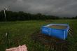 Swimming pool in the meadow.