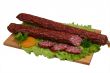 Smoked sausage on wooden board 2