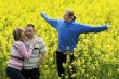 Three people in meadow