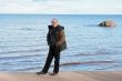 Middle-aged man at the sea.