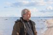 Middle-aged man at the sea.
