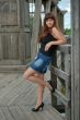 Beauty girl on the old-time bridge.