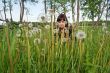 Beauty girl in meadow.