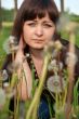Portrait of beauty girl with dandelions.