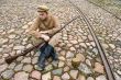 Soldier with boiler and gun in retro style picture