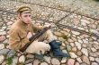 Soldier with boiler and gun in retro style picture