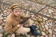 Soldier with boiler and gun in retro style picture