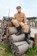 Picture with soldier sitting on the bundles
