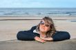Woman relaxing at the sea.