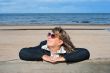 Woman relaxing at the sea.
