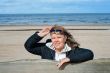 Woman relaxing at the sea.