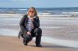 Woman relaxing at the sea.