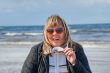 Woman relaxing at the sea.