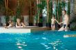 Family in swimming-pool