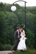 Bride and groom under lantern