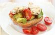 Tasty avocado, tomato and chicken bruschetta