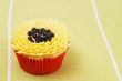 Vanilla cupcake with sunflower decoration