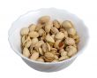 Pistachios on a plate, isolated