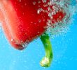 red pepper between bubbles 