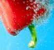 red pepper between bubbles 