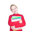 child with a stack of notebooks