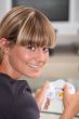 Young woman playing a video game