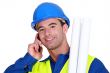 Construction worker talking on the phone