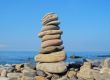 Balanced stones on the seashore summertime