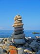 Balanced stones on the seashore summertime