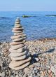Balanced stones on the seashore summertime