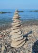 Balanced stones on the seashore summertime