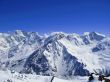 Caucasus mountains under the snow and clear sky