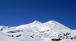Caucasus mountains under the snow and clear sky
