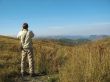 Man and caucasus mountains