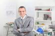 Smiling architect in office