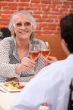 senior woman having lunch in a restaurant