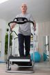Middle-aged man on treadmill at home
