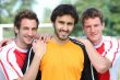 portrait of 3 football players