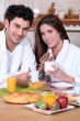 Couple eating breakfast