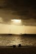 Drifting boat on a sunset