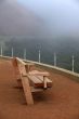 Wooden bench in a fog