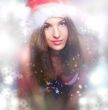 20-25 years old beautiful woman in christmas hat and swimsuit.