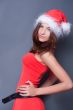20-25 years od beautiful woman in christmas dress posing.