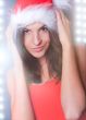 20-25 years od beautiful woman in christmas dress dancing at clu