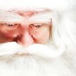 Santa Claus portrait smiling isolated over a white background
